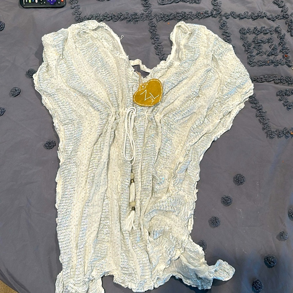 Silver and white bathing suit cover up. New with tags